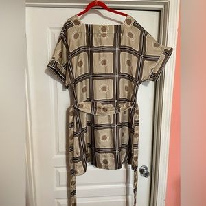 Never warn no tags, woman’s mid dress sz l.